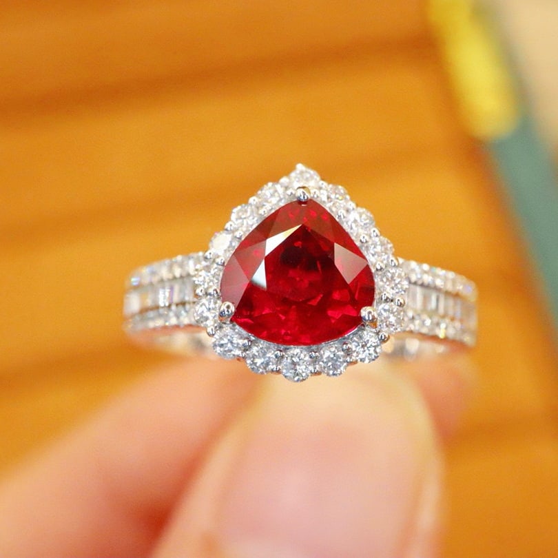 14k Gold 2.04 Ctw Natural Ruby & Diamond Ring: Ref:231000107 // gold content:14k gold // ring size:7. 25us // // main gemstone:ruby // shape:pear // carat weight:1. 56ct // color:pigeonblood red // treatment:natural // // adjacent gemstone 2 : dia