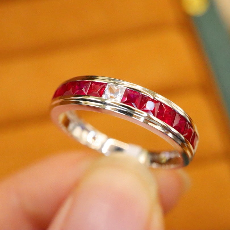 14k Gold 0.96 Ctw Natural Ruby & Sapphire Ring: Ref:231000131 // gold content:14k gold // ring size:7. 25us // // main gemstone:ruby // shape:princess // carat weight:0. 86ct // color:red // treatment:natural // // adjacent gemstone 2 :