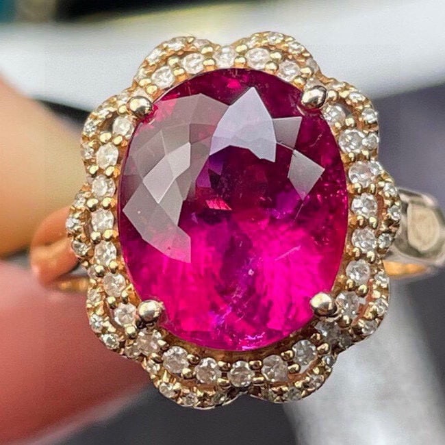 14k Gold 5.78 Ct Natural Tourmaline & Diamond Ring: Ref:231000146 // gold content:14k gold // ring size:7. 25us // // main gemstone:tourmaline // shape:oval // carat weight:5. 78ct // color:red // treatment:natural // // adjacent gemstone 2 :