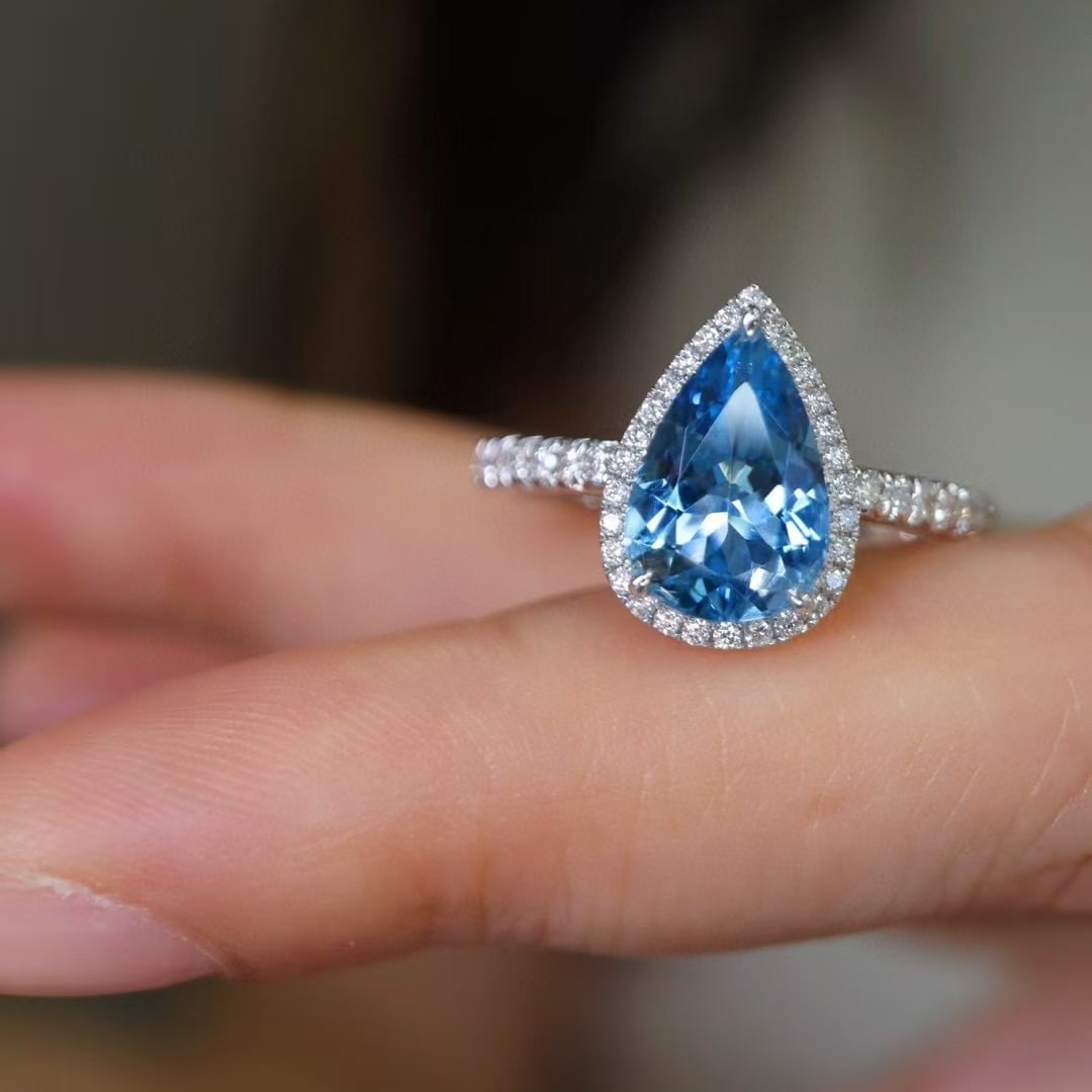 14k Gold 1.49 Ctw Natural Aquamarine & Diamond Ring: Ref:231000188 // gold content:14k gold // ring size:7. 25us // // main gemstone:aquamarine // shape:pear // carat weight:1. 20ct // color:santa maria color // treatment:natural // // adjacent