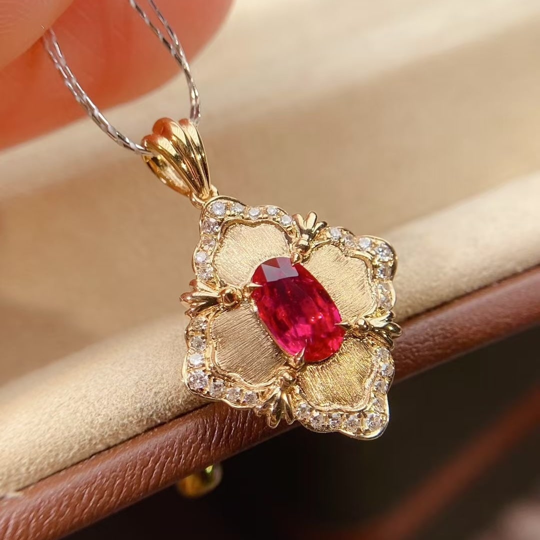 14k Gold 0.83 Ctw Natural Ruby & Diamond Pendant( Without Chain ): Ref:231000213 // gold content:14k gold // main gemstone:ruby // shape:oval // carat weight:0. 7ct // color:red // treatment:natural // // adjacent gemstone 2 : diamond // shape:round // carat