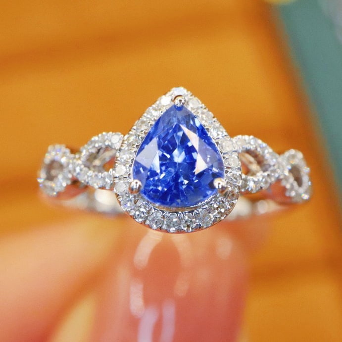 14k Gold 1.26 Ctw Natural Sapphire & Diamond Ring: Ref:231000219 // gold content:14k gold // ring size:7. 25us // // main gemstone:sapphire // shape:pear // carat weight:1. 03ct // color:cornflower blue // treatment:natural // // adjacent gemstone