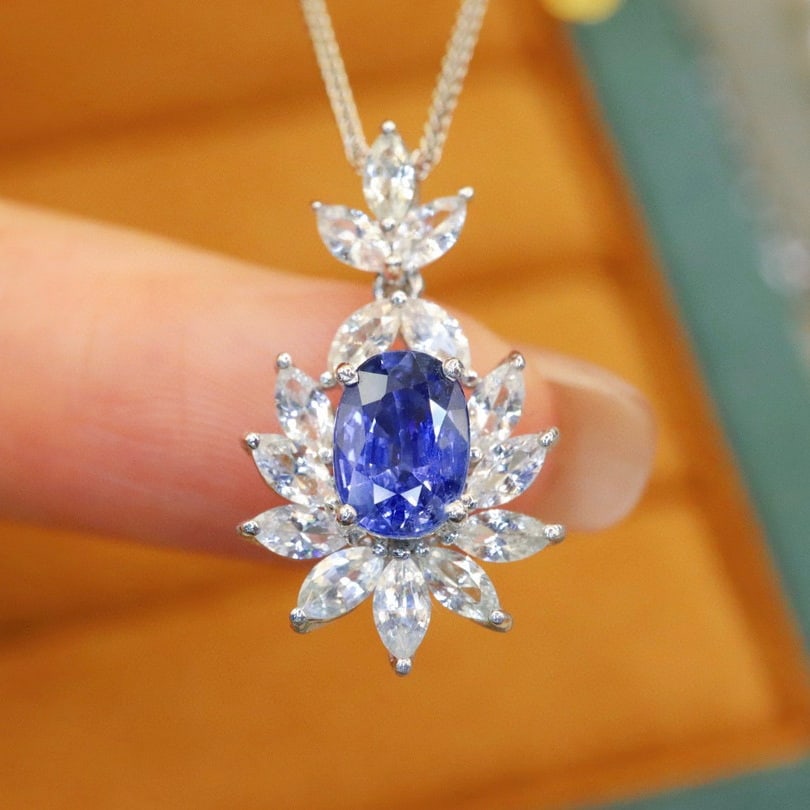 14k Gold 2.40 Ctw Natural Sapphire & Sapphire Pendant( Without Chain ): Ref:231000221 // gold content:14k gold // main gemstone:sapphire // shape:oval // carat weight:1. 15ct // color:blue // treatment:natural // // adjacent gemstone 2 : sapphire // number of stones:14 //