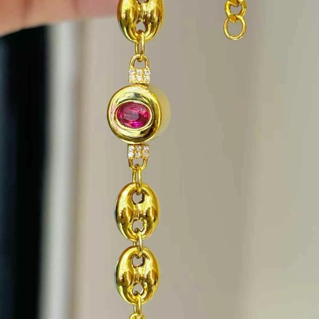 14k Gold 0.3 Ct Natural Ruby & Diamond Bracelet: Ref:231000245 // gold content:14k gold // main gemstone:ruby // shape:oval // carat weight:0. 3ct // color:red // treatment:natural // // adjacent gemstone 2 : diamond // shape:round // clarity