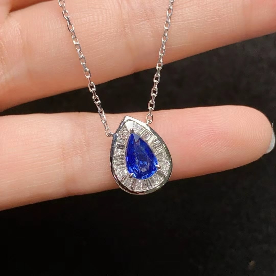 14k Gold 1 Ct Natural Sapphire & Diamond Necklace: Ref:231000268 // gold content:14k gold // main gemstone:sapphire // shape:pear // carat weight:1ct // color:blue // treatment:natural // // adjacent gemstone 2 : diamond // number of stones:28 //