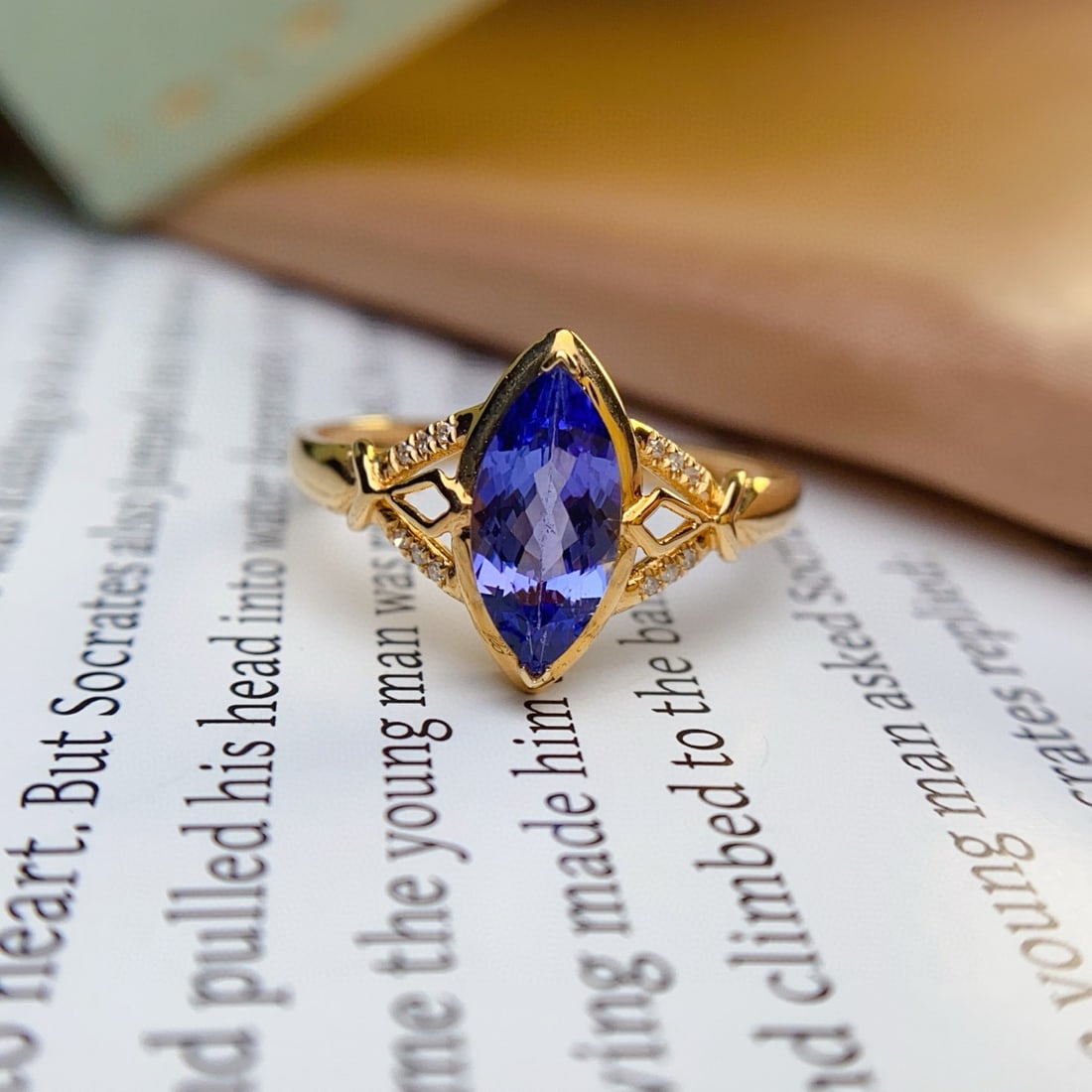 14k Gold 1.15 Ct Natural Tanzanite & Diamond Ring: Ref:231000287 // gold content:14k gold // ring size:7. 25us // // main gemstone:tanzanite // shape:marquise // carat weight:1. 15ct // color:blue // treatment:natural // // adjacent gemstone 2 :