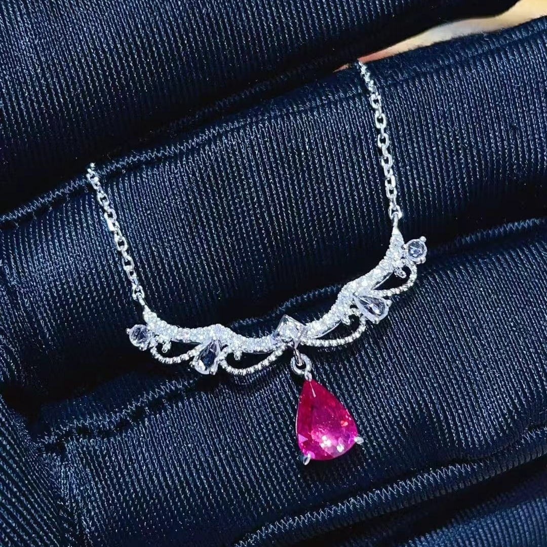 14k Gold 0.9 Ct Natural Ruby & Diamond & Sapphire Necklace: Ref:231000306 // gold content:14k gold // main gemstone:ruby // shape:pear // carat weight:0. 9ct // color:red // treatment:natural // // adjacent gemstone 2 : diamond // number of stones:21 //