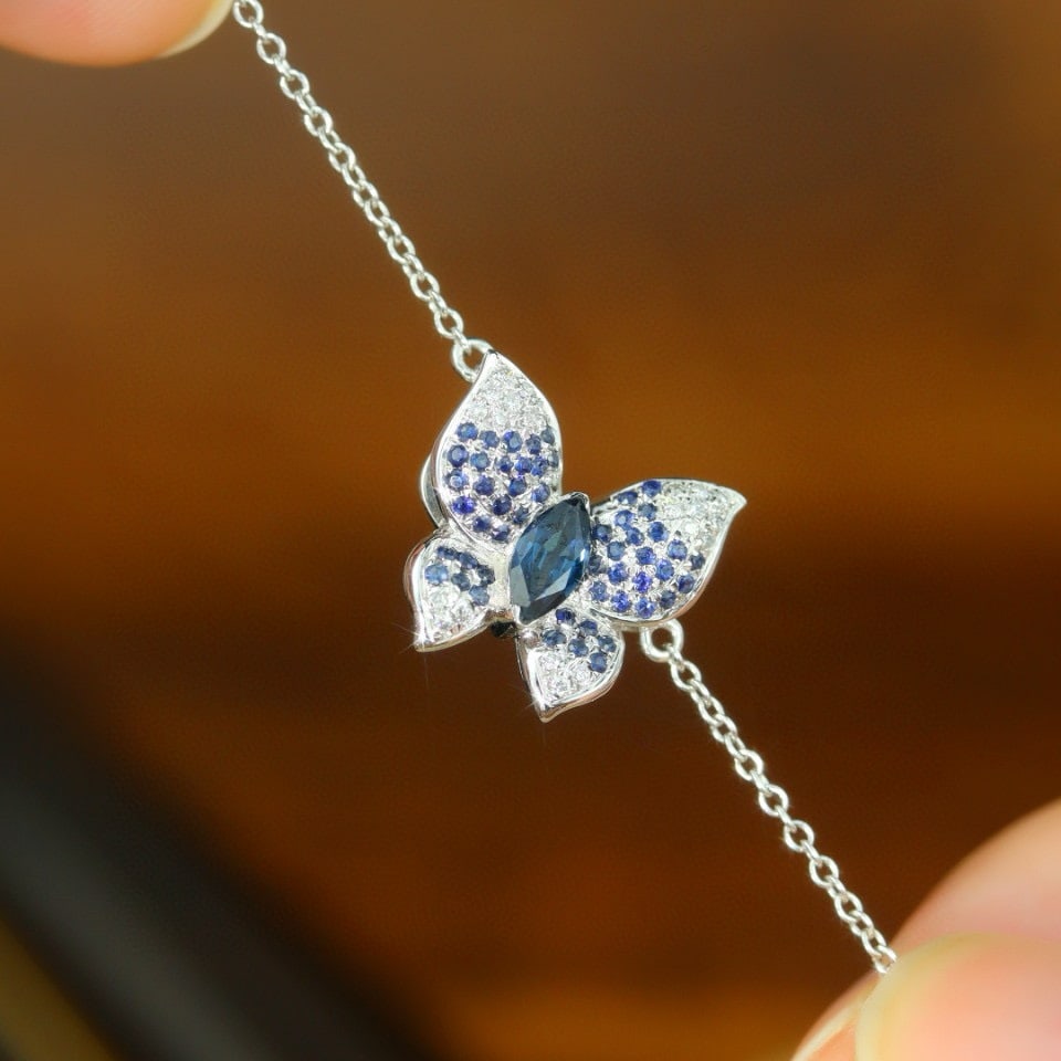 14k Gold 0.52 Ctw Natural Sapphire & Diamond Bracelet: Ref:231000341 // gold content:14k gold // main gemstone:sapphire // shape:marquise // carat weight:0. 33ct // color:blue // treatment:natural // // adjacent gemstone 2 : diamond // shape:round // cara