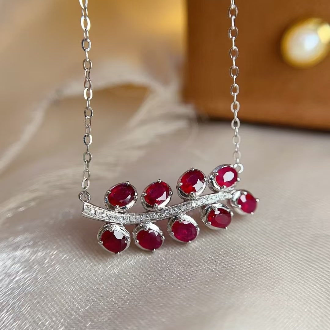 14k Gold 2.00 Ct Vivid Red Natural Ruby & Diamond Necklace: Ref:231000371 // gold content:14k gold // main gemstone:ruby // shape:oval // carat weight:2. 00ct // color:vivid red // treatment:natural // // adjacent gemstone 2 : diamond // number of stones:27