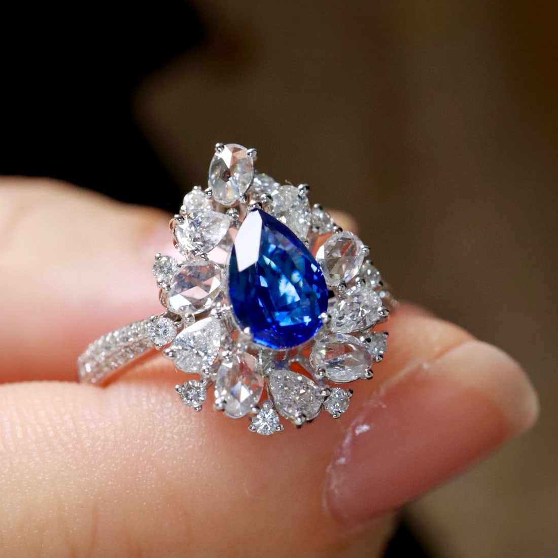 14k Gold 1.91 Ctw Natural Sapphire & Diamond Ring: Ref:231000384 // gold content:14k gold // ring size:7. 25us // // main gemstone:sapphire // shape:pear // carat weight:1. 02ct // color:royal blue // treatment:natural // // adjacent gemstone 2 :