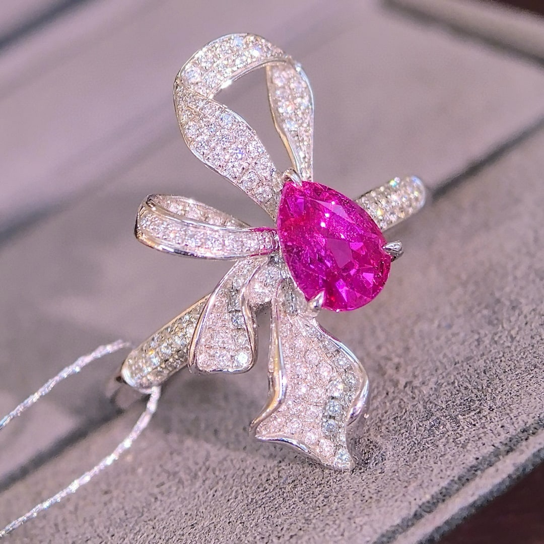 14k Gold 1.62 Ctw Natural Sapphire & Diamond Ring: Ref:231000396 // gold content:14k gold // ring size:7. 25us // // main gemstone:sapphire // shape:pear // carat weight:1. 21ct // color:pink // treatment:natural // // adjacent gemstone 2 :