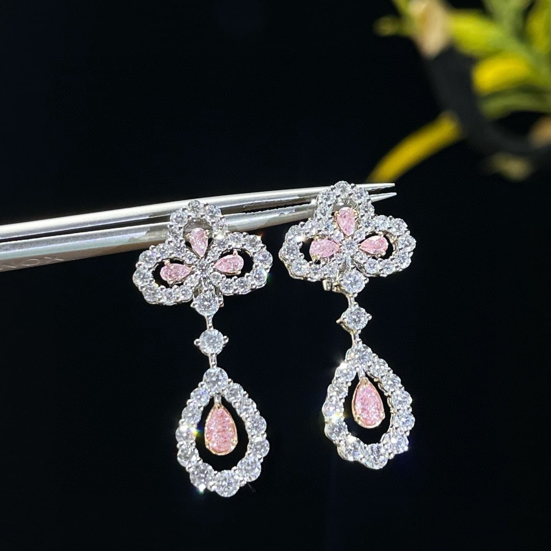 14k Gold 3.06 Ctw Natural Pink Diamond & Diamond Earrings: Ref:231000411 // gold content:14k gold // main gemstone:pink diamond // shape:pear // carat weight:0. 74ct // color:pink // treatment:natural // // adjacent gemstone 2 : diamond // shape:round //