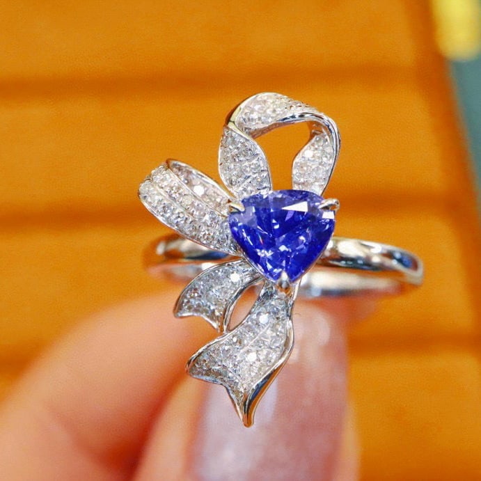 14k Gold 1.49 Ctw Natural Sapphire & Diamond Ring: Ref:231000425 // gold content:14k gold // ring size:7. 25us // // main gemstone:sapphire // shape:pear // carat weight:1. 24ct // color:blue // treatment:natural // // adjacent gemstone 2 :