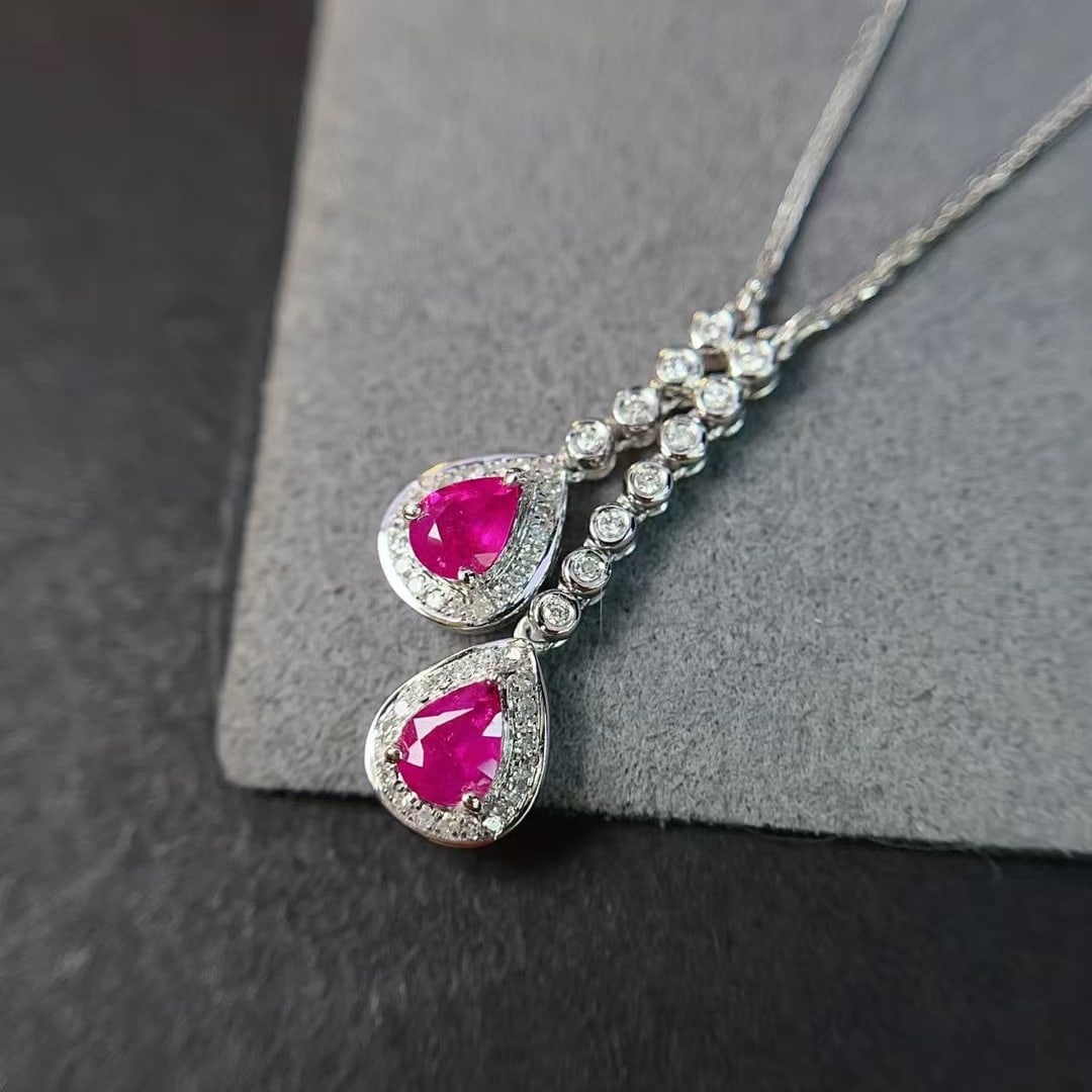 14k Gold 0.80 Ct Natural Ruby & Diamond Necklace: Ref:231000443 // gold content:14k gold // main gemstone:ruby // shape:pear // carat weight:0. 80ct // color:red // treatment:natural // // adjacent gemstone 2 : diamond // number of stones:51 //