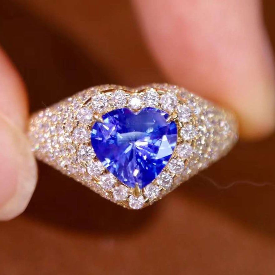 14k Gold 2.38 Ctw Natural Sapphire & Diamond Ring: Ref:231101023 // gold content:14k gold // ring size:7. 25us // // main gemstone:sapphire // shape:heart // carat weight:1. 55ct // color:blue // treatment:natural // // adjacent gemstone 2 :