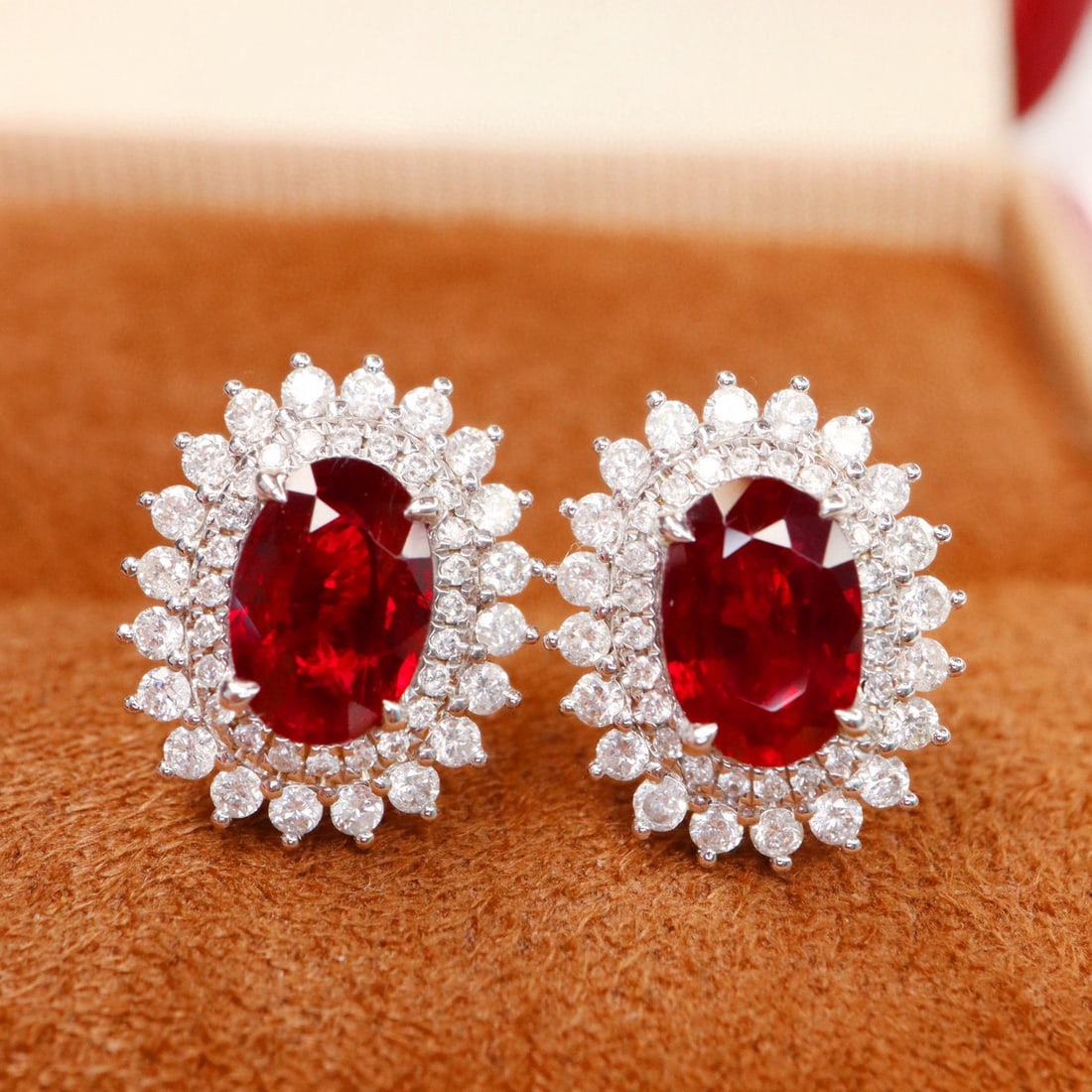 14k Gold 2.22 Ctw Natural Ruby & Diamond Earrings: Ref:231101149 // gold content:14k gold // main gemstone:ruby // shape:oval // carat weight:1. 68ct // color:red // treatment:natural // // adjacent gemstone 2 : diamond // shape:round // carat weight: