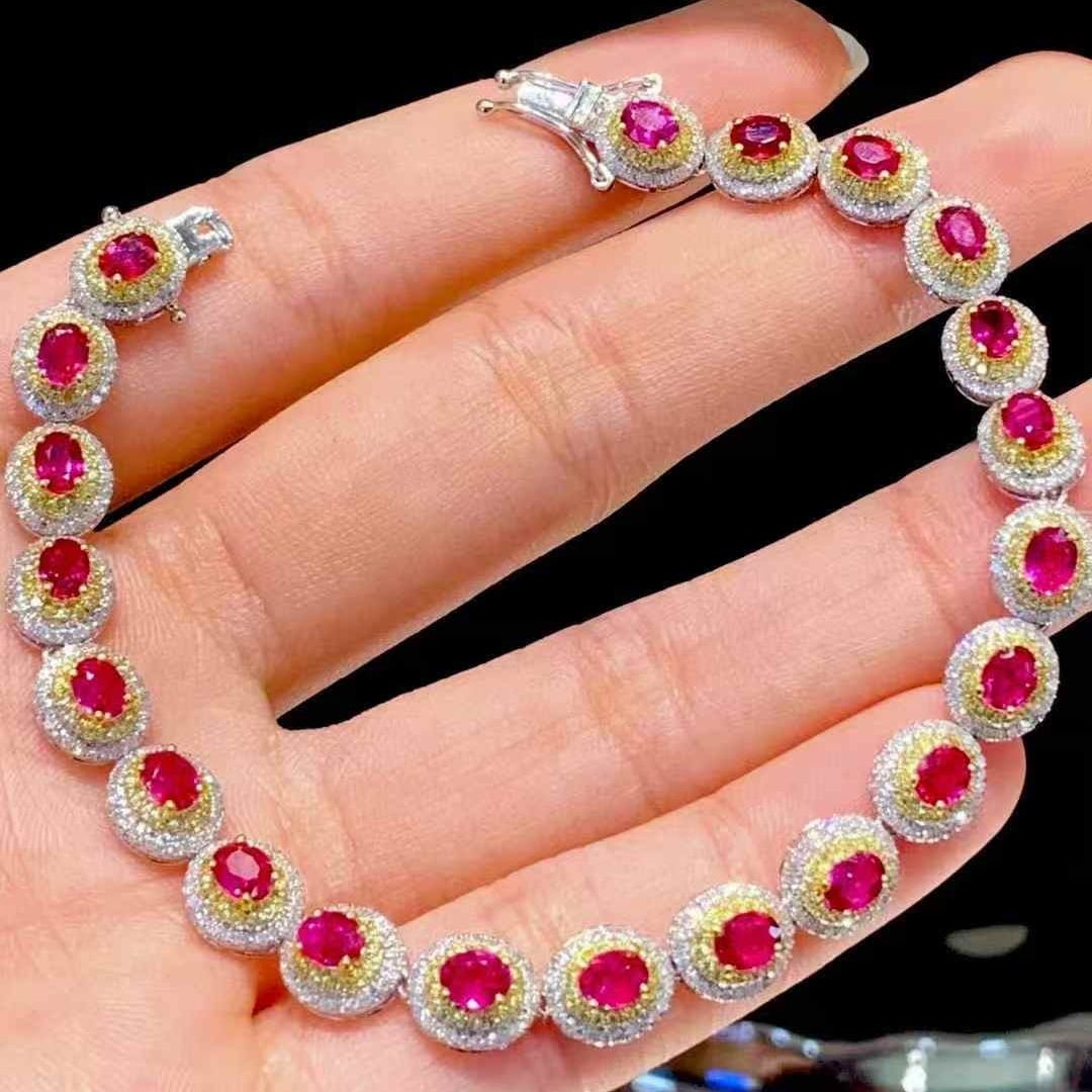 14k Gold 4.35 Ct Natural Ruby & Diamond Bracelet: Ref:231101150 // gold content:14k gold // main gemstone:ruby // shape:oval // carat weight:4. 35ct // color:red // treatment:natural // // adjacent gemstone 2 : diamond // shape:round // clarity grade