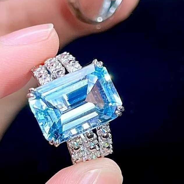 14k Gold 7.46 Ctw Natural Aquamarine & Diamond Ring: Ref:231101242 // gold content:14k gold // ring size:7. 25us // // main gemstone:aquamarine // shape:octagonal // carat weight:6. 8ct // color:blue // treatment:natural // // adjacent gemstone 2 :