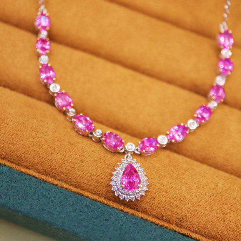 14k Gold 8.89 Ctw Natural Padparadscha Sapphire & Diamond Necklace: Ref:231102042 // gold content:14k gold // main gemstone:padparadscha sapphire // shape:multiple // carat weight:8. 5ct // color:orangish pink // treatment:natural // // adjacent gemstone 2 : diamond /