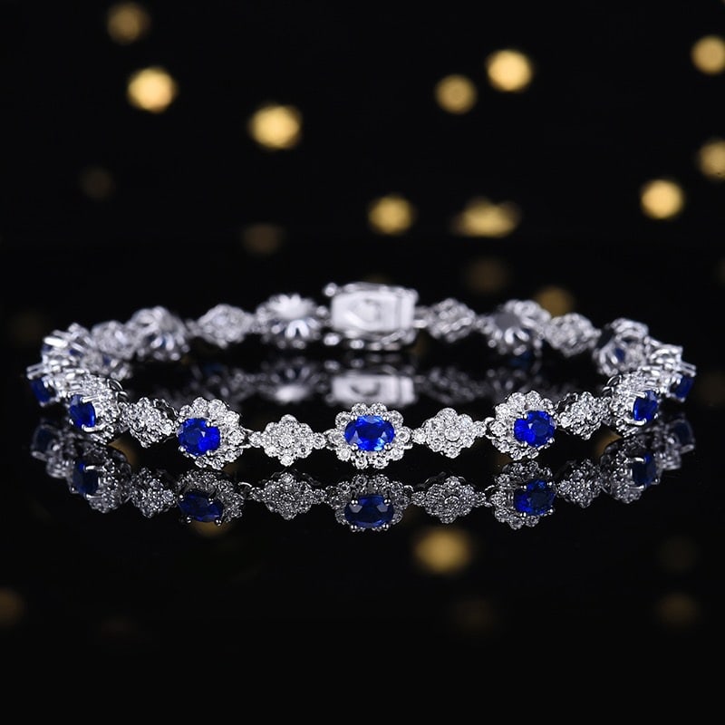 14k Gold 3.21 Ctw Natural Sapphire & Diamond Bracelet: Ref:231102065 // gold content:14k gold // main gemstone:sapphire // shape:oval // carat weight:2. 76ct // color:blue // treatment:natural // // adjacent gemstone 2 : diamond // number of stones:228 //