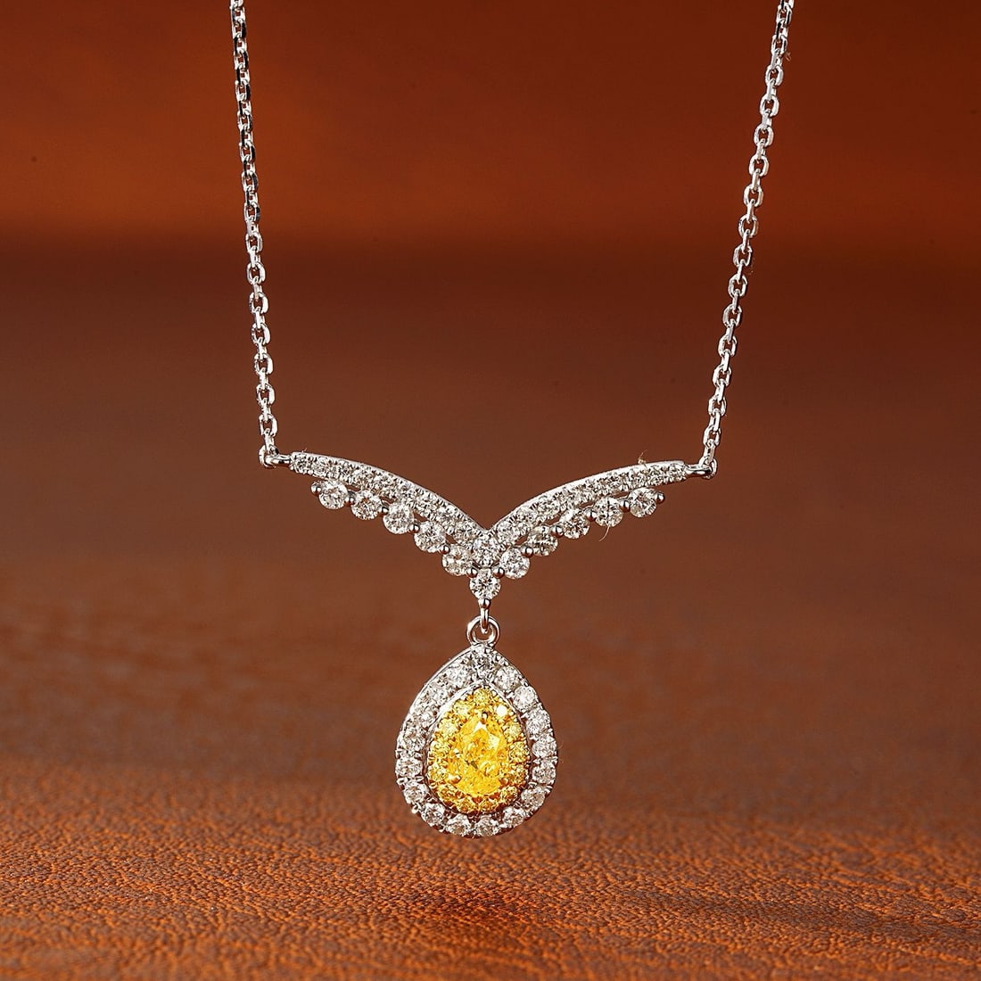 14k Gold 0.48 Ctw Natural Yellow Diamond & Diamond Necklace: Ref:231102121 // gold content:14k gold // main gemstone:yellow diamond // shape:pear // carat weight:0. 12ct // color:yellow // treatment:natural // // adjacent gemstone 2 : diamond // shape:round