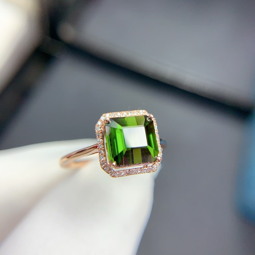 14k Gold 2.6 Ct Natural Tourmaline & Diamond Ring: Ref:231102124 // gold content:14k gold // ring size:7. 25us // // main gemstone:tourmaline // shape:octagonal // carat weight:2. 6ct // color:green // treatment:natural // // adjacent gemstone 2 :