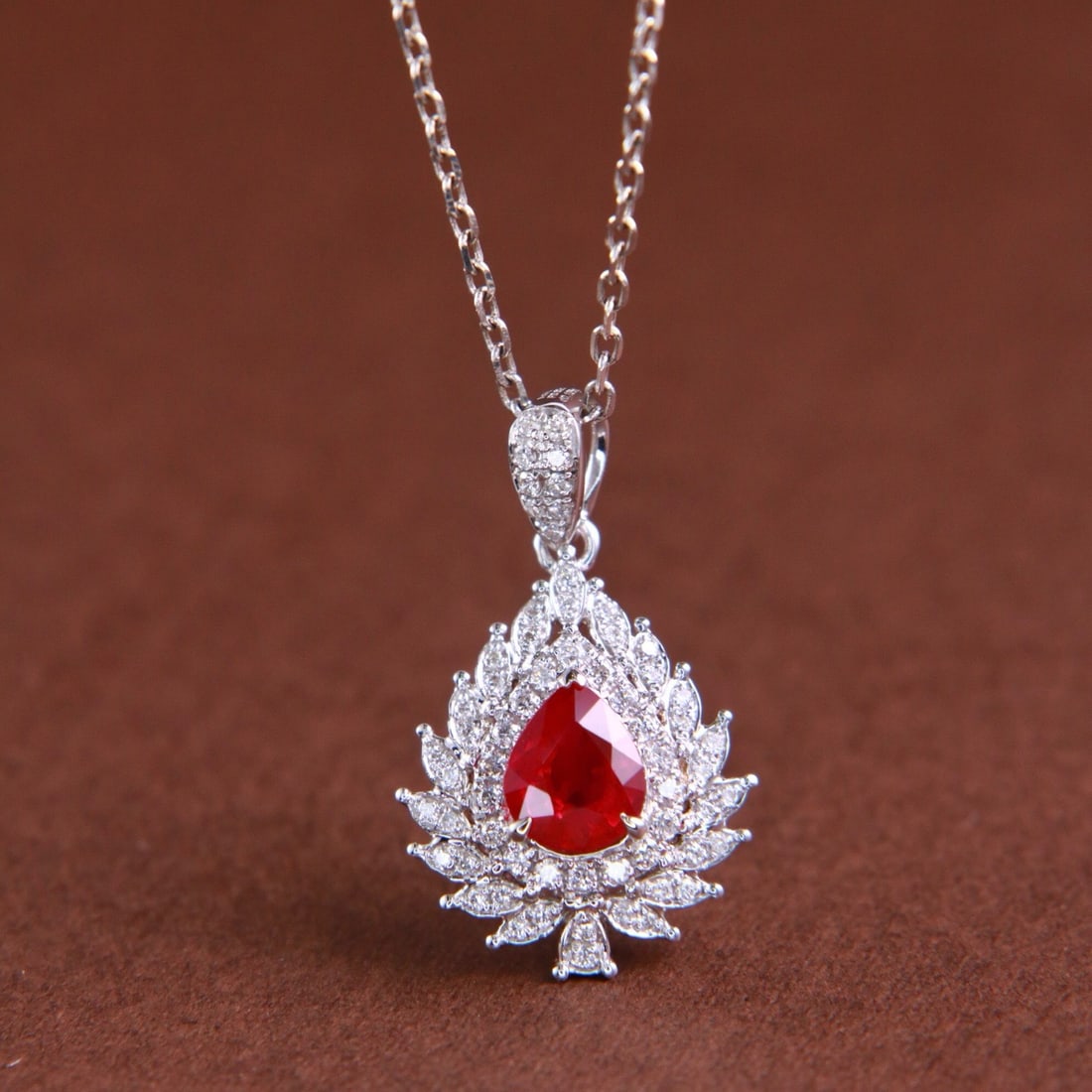 14k Gold 0.80 Ctw Natural Ruby & Diamond Pendant( Without Chain ): Ref:231102140 // gold content:14k gold // main gemstone:ruby // shape:pear // carat weight:0. 62ct // color:pigeonblood red // treatment:natural // // adjacent gemstone 2 : diamond // shape:round // c