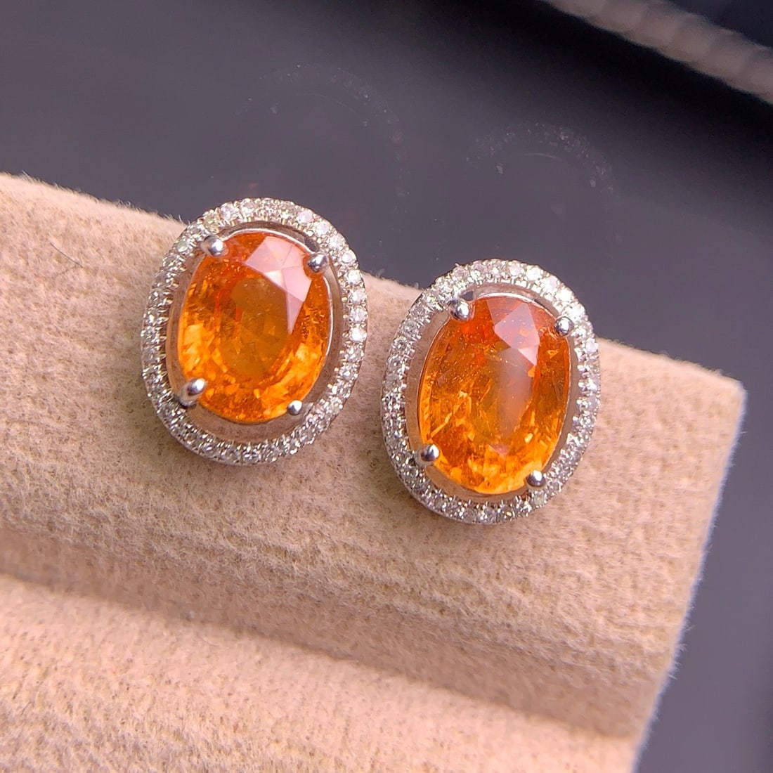 14k Gold 3.8 Ct Natural Spessartine & Diamond Earrings: Ref:231102148 // gold content:14k gold // main gemstone:spessartine // shape:oval // carat weight:3. 8ct // color:orange // treatment:natural // // adjacent gemstone 2 : diamond // shape:round // clar