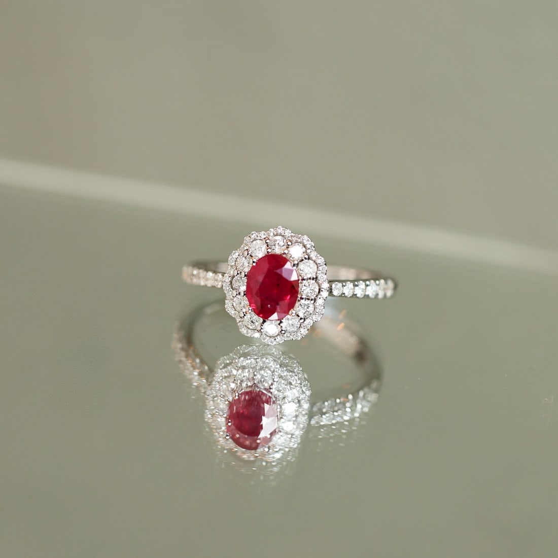 14k Gold 1.15 Ctw Natural Ruby & Diamond Ring: Ref:231102165 // gold content:14k gold // ring size:7. 25us // // main gemstone:ruby // shape:oval // carat weight:0. 7ct // color:red // treatment:natural // // adjacent gemstone 2 : diamond // shape