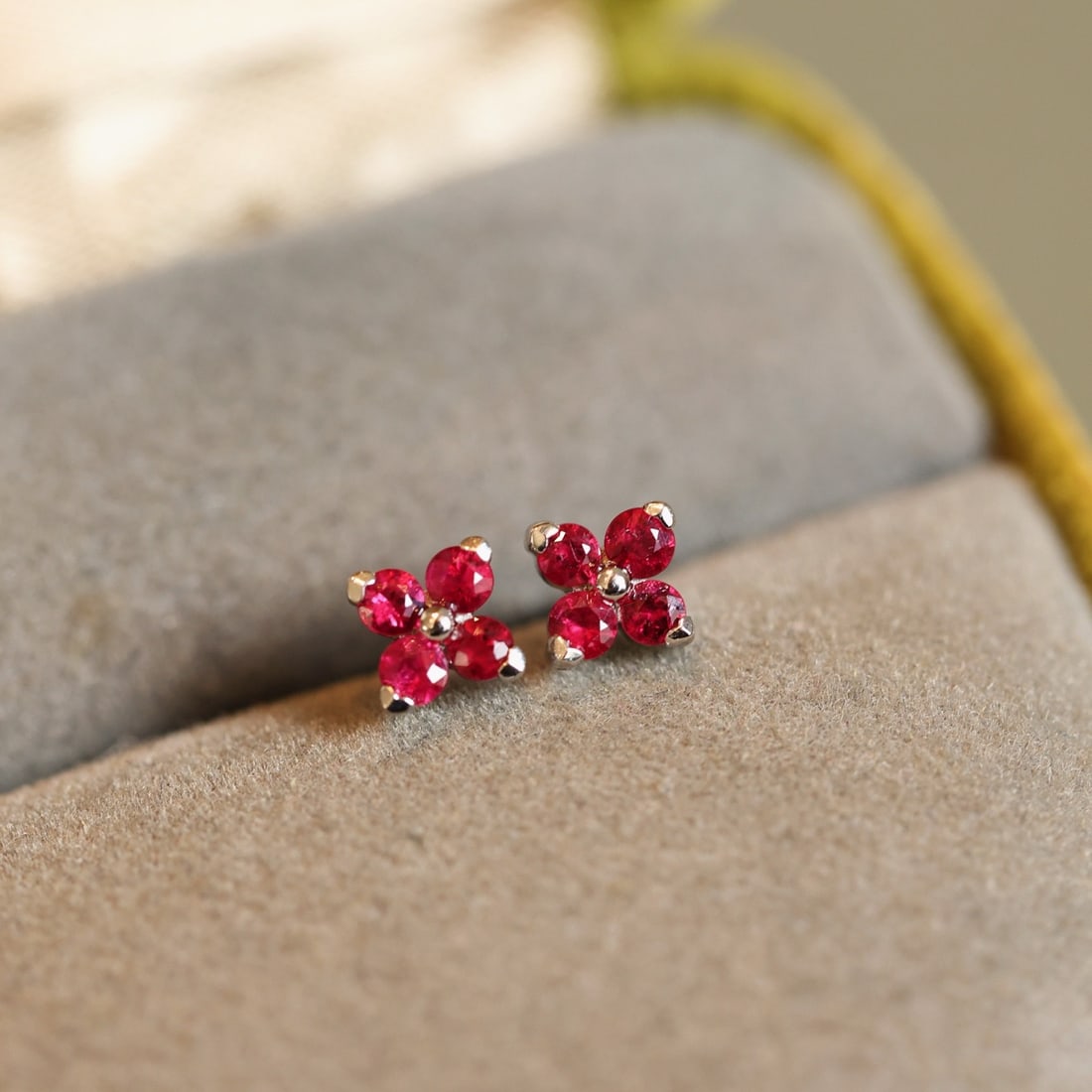 14k Gold 0.35 Ct Natural Ruby Earrings: Ref:231102168 // gold content:14k gold // main gemstone:ruby // shape:round // carat weight:0. 35ct // color:red // treatment:natural // cut grade:g // Condition: NewLow Estimate: 1300.00High