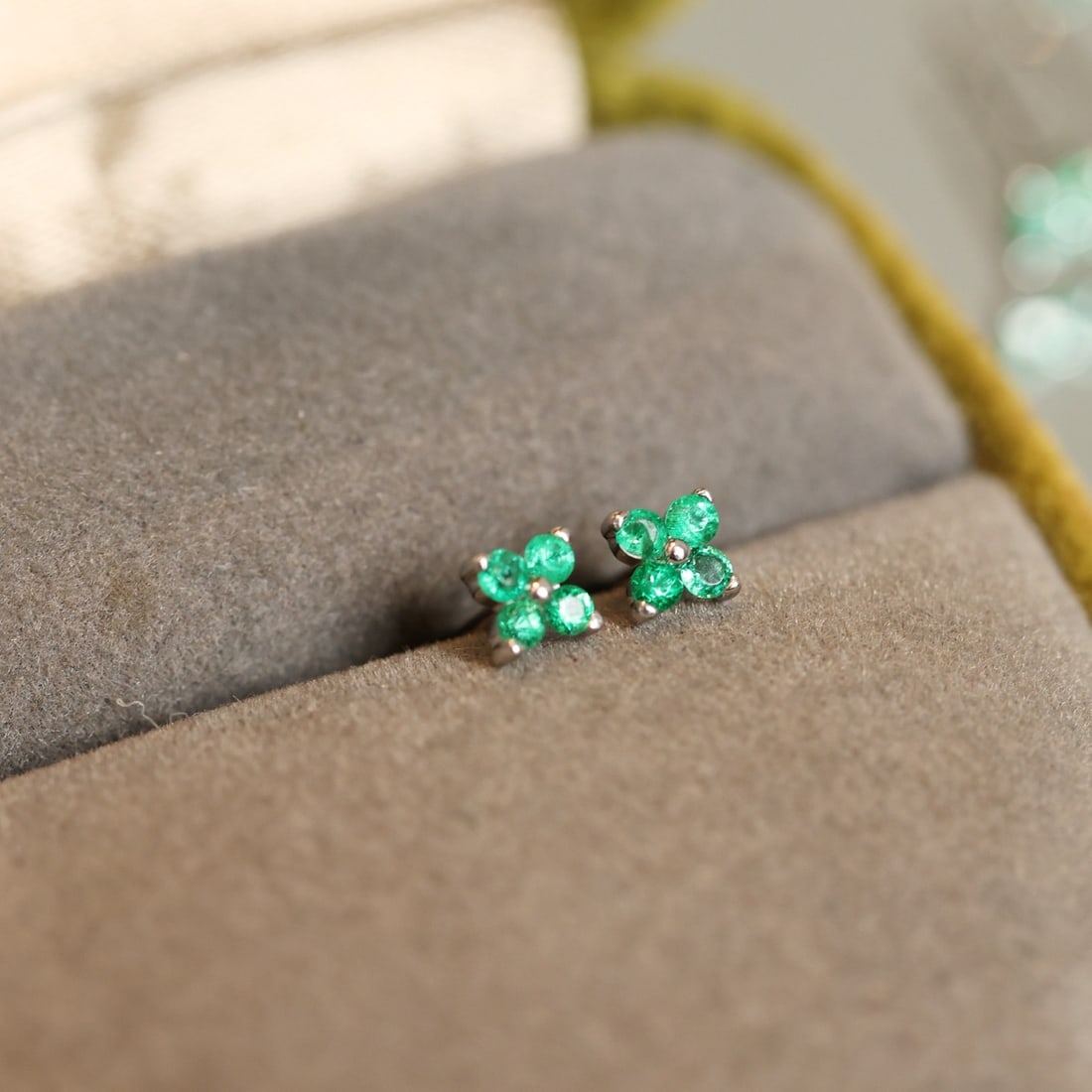 14k Gold 0.15 Ct Natural Emerald Earrings: Ref:231102177 // gold content:14k gold // main gemstone:emerald // shape:round // carat weight:0. 15ct // color:green // treatment:natural // cut grade:g // Condition: NewLow Estimate: 1300.00High