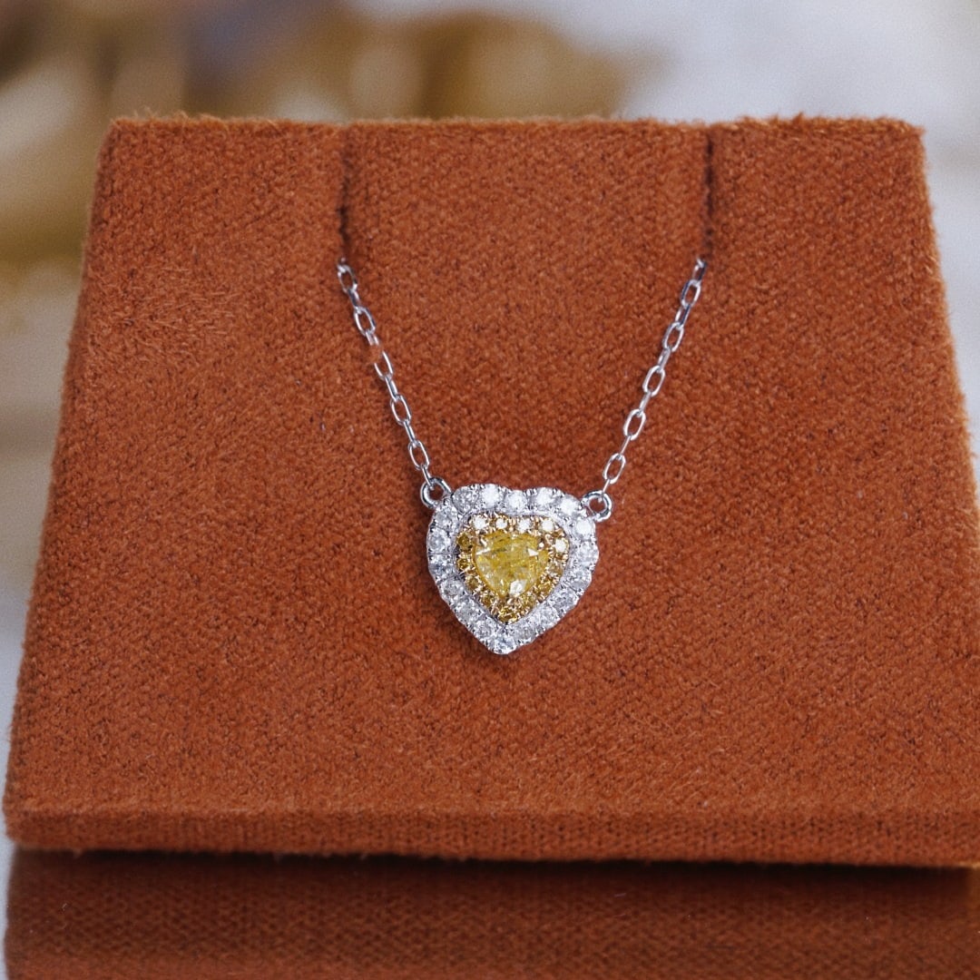 14k Gold 0.30 Ctw Natural Yellow Diamond & Diamond Necklace: Ref:231102204 // gold content:14k gold // main gemstone:yellow diamond // shape:heart // carat weight:0. 15ct // color:yellow // treatment:natural // // adjacent gemstone 2 : diamond // shape:round