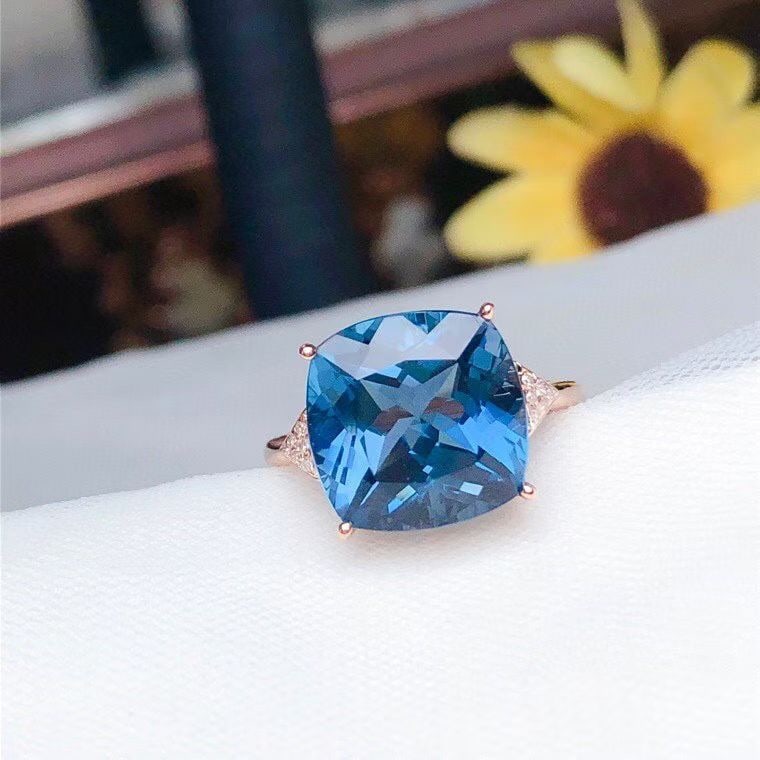 14k Gold 8.40 Ct Natural Topaz & Diamond Ring: Ref:231102278 // gold content:14k gold // ring size:7. 25us // // main gemstone:topaz // shape:cushion // carat weight:8. 40ct // color:blue // treatment:natural // // adjacent gemstone 2 :