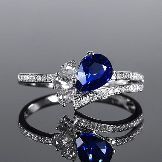 14k Gold 1.30 Ctw Natural Sapphire & Diamond Ring: Ref:231102283 // gold content:14k gold // ring size:7. 25us // // main gemstone:sapphire // shape:pear // carat weight:1. 08ct // color:royal blue // treatment:natural // // adjacent gemstone 2 :