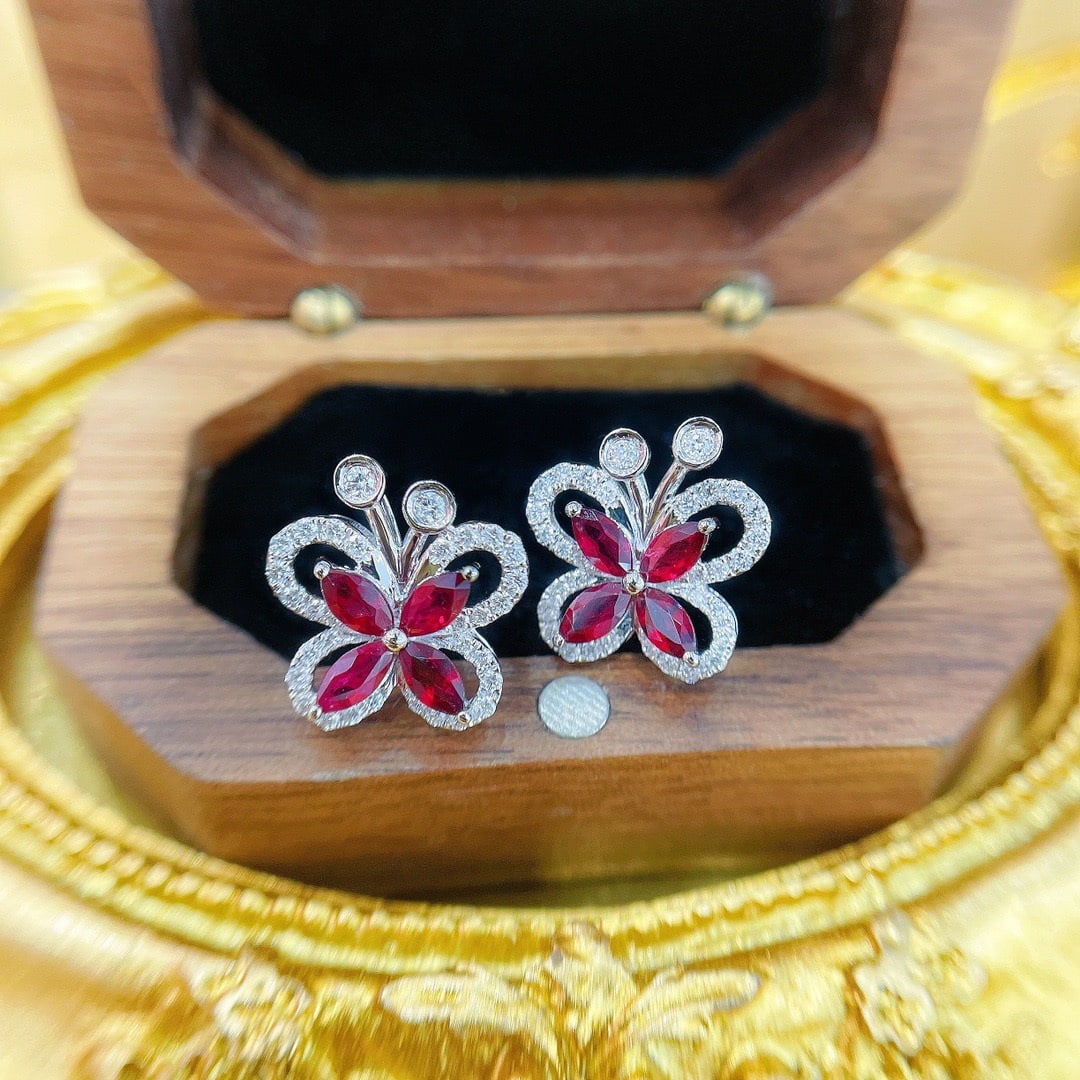 14k Gold 2.00 Ctw Natural Ruby & Diamond Earrings: Ref:231102304 // gold content:14k gold // main gemstone:ruby // shape:marquise // carat weight:1. 50ct // color:red // treatment:natural // // adjacent gemstone 2 : diamond // shape:round // carat