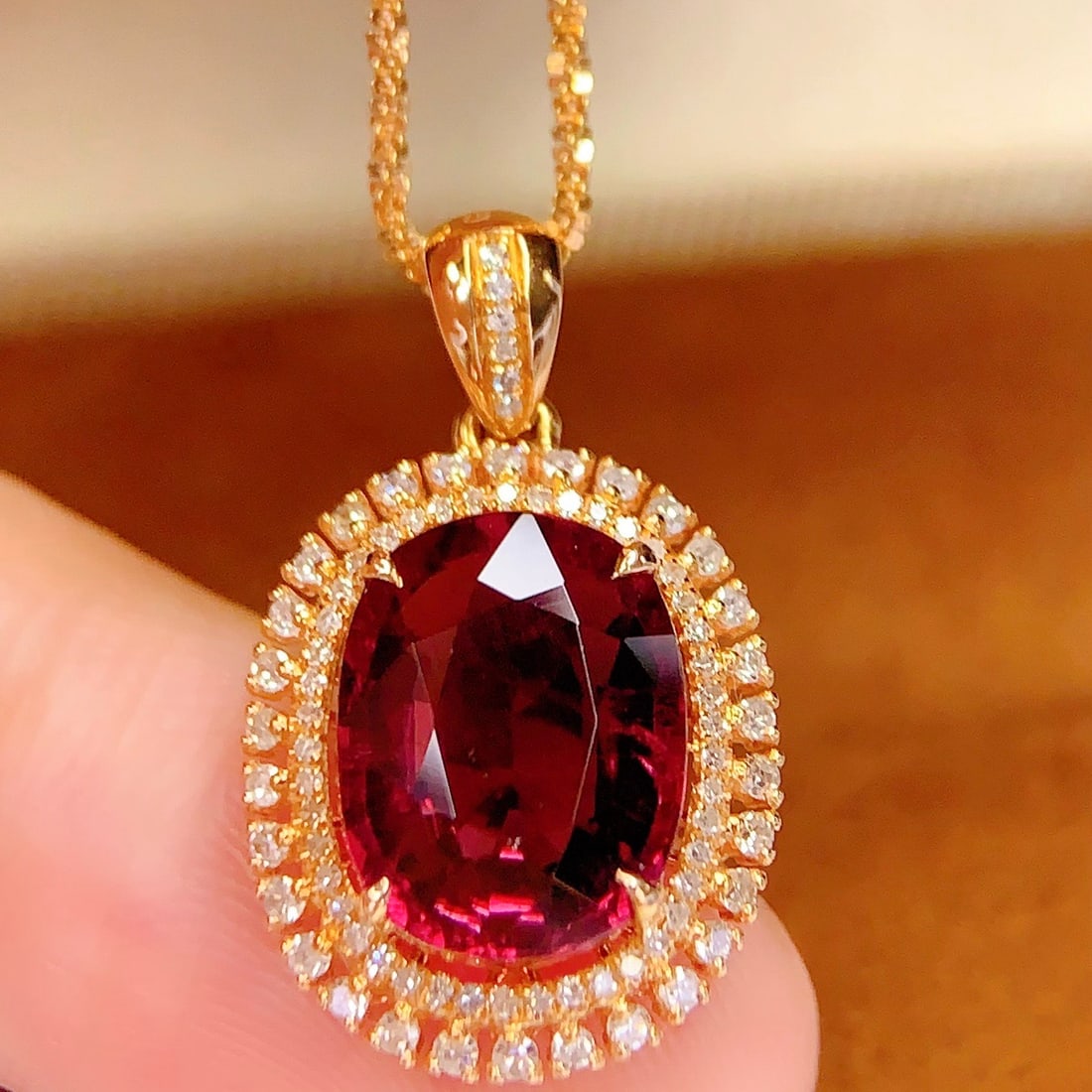 14k Gold 4 Ct Natural Tourmaline & Diamond Pendant( Without Chain ): Ref:231102329 // gold content:14k gold // main gemstone:tourmaline // shape:oval // carat weight:4ct // color:red // treatment:natural // // adjacent gemstone 2 : diamond // number of stones:80 // sha