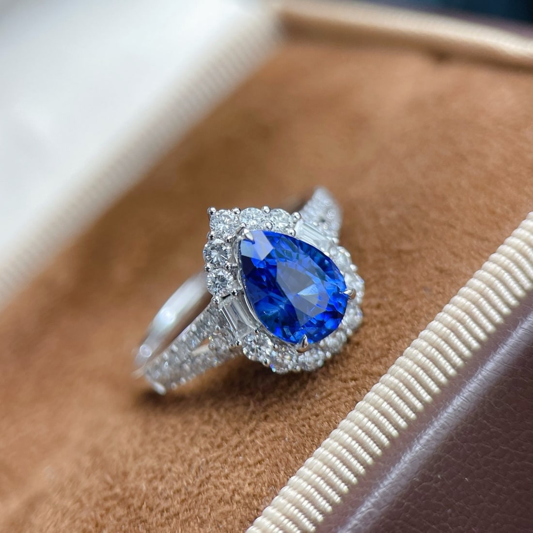 14k Gold 2.1 Ct Natural Sapphire & Diamond Ring: Ref:231102369 // gold content:14k gold // ring size:7. 25us // // main gemstone:sapphire // shape:pear // carat weight:2. 1ct // color:royal blue // treatment:natural // // adjacent gemstone 2 :