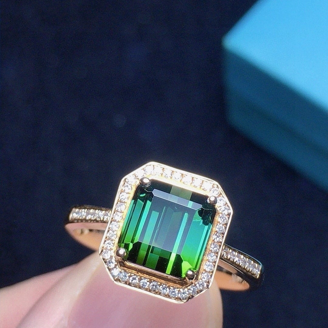 14k Gold 2.52 Ct Natural Tourmaline & Diamond Ring: Ref:231102372 // gold content:14k gold // ring size:7. 25us // // main gemstone:tourmaline // shape:octagonal // carat weight:2. 52ct // color:green // treatment:natural // // adjacent gemstone 2 : di