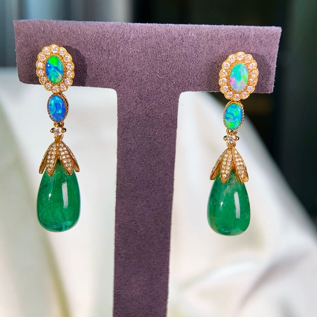14k Gold 17.56 Ctw Natural Emerald & Opal & Diamond Earrings: Ref:231102377 // gold content:14k gold // main gemstone:emerald // shape:pear // carat weight:16. 78ct // color:green // treatment:natural // // adjacent gemstone 2 : opal // shape:oval // color:color