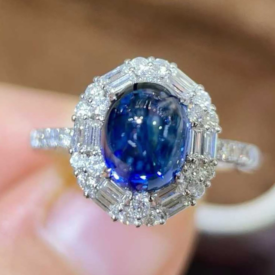 14k Gold 4.00 Ctw Natural Sapphire & Diamond Ring: Ref:231102414 // gold content:14k gold // ring size:7. 25us // // main gemstone:sapphire // shape:oval // carat weight:3. 39ct // color:blue // treatment:natural // // adjacent gemstone 2 : diamond //