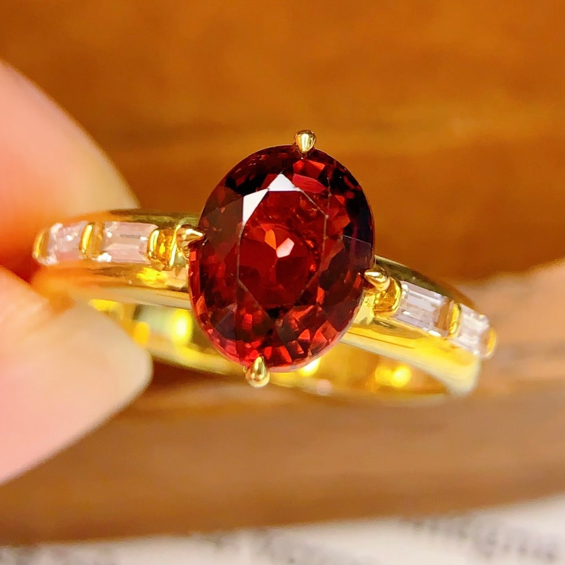 14k Gold 2.7 Ct Natural Tourmaline & Sapphire Ring: Ref:231102420 // gold content:14k gold // ring size:7. 25us // // main gemstone:tourmaline // shape:oval // carat weight:2. 7ct // color:red // treatment:natural // // adjacent gemstone 2 :