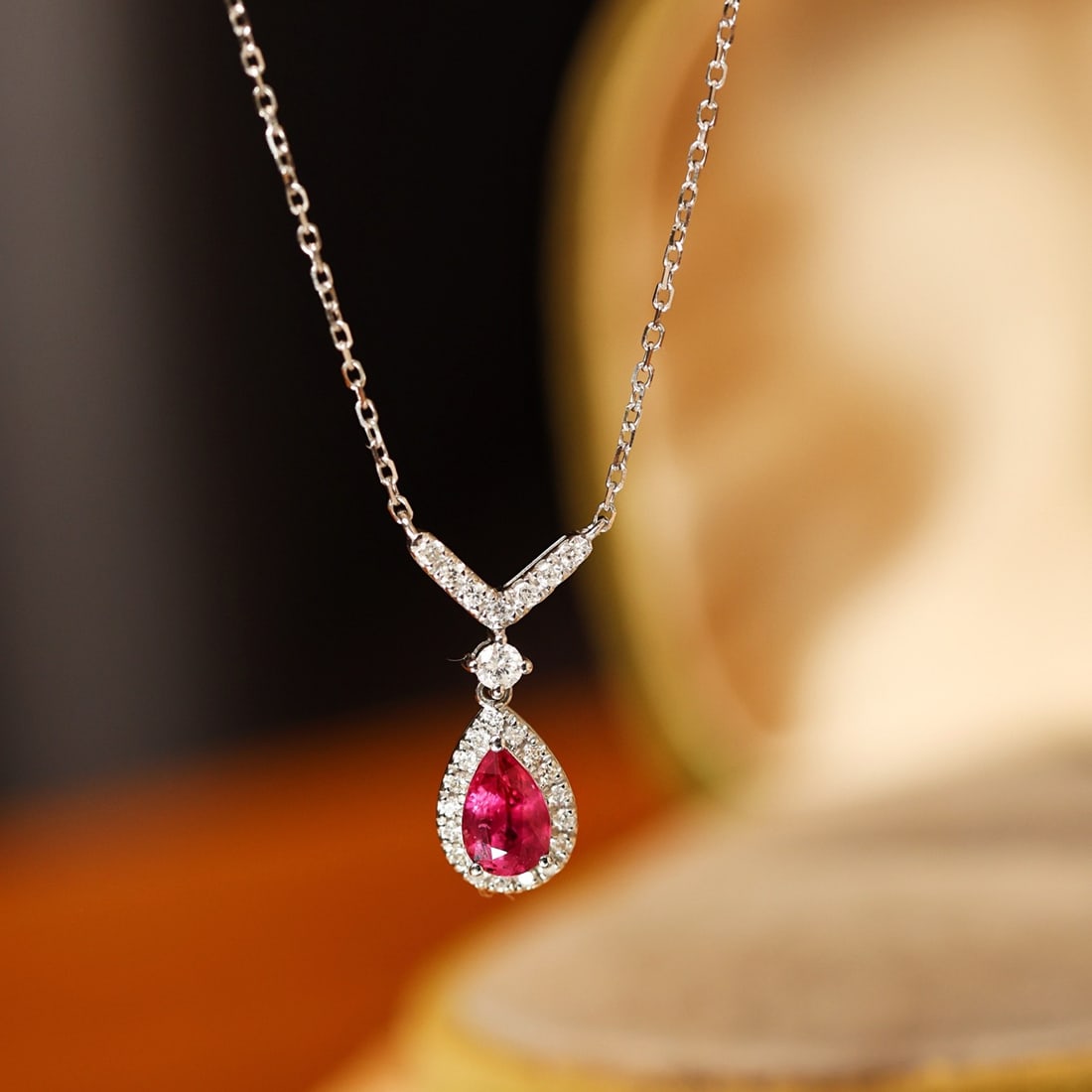 14k Gold 0.68 Ctw Natural Ruby & Diamond Necklace: Ref:231102444 // gold content:14k gold // main gemstone:ruby // shape:pear // carat weight:0. 5ct // color:red // treatment:natural // // adjacent gemstone 2 : diamond // shape:round // carat