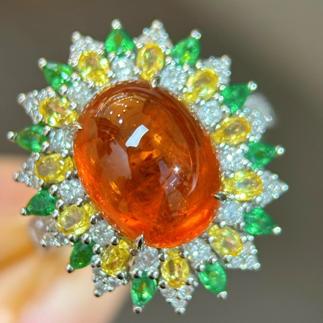 14k Gold 7.50 Ctw Natural Spessartine & Diamond Ring: Ref:231103136 // gold content:14k gold // ring size:7. 25us // // main gemstone:spessartine // shape:oval // carat weight:6. 98ct // color:orange // treatment:natural // // adjacent gemstone 2 :