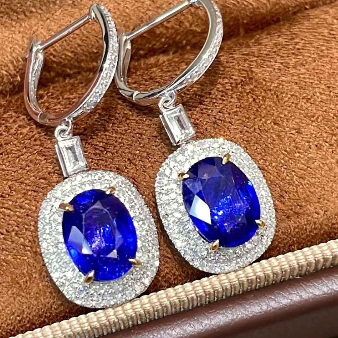 14k Gold 4.0 Ctw Natural Sapphire & Diamond Earrings: Ref:231103146 // gold content:14k gold // main gemstone:sapphire // shape:oval // carat weight:3. 5ct // color:royal blue // treatment:natural // // adjacent gemstone 2 : diamond // shape:round //