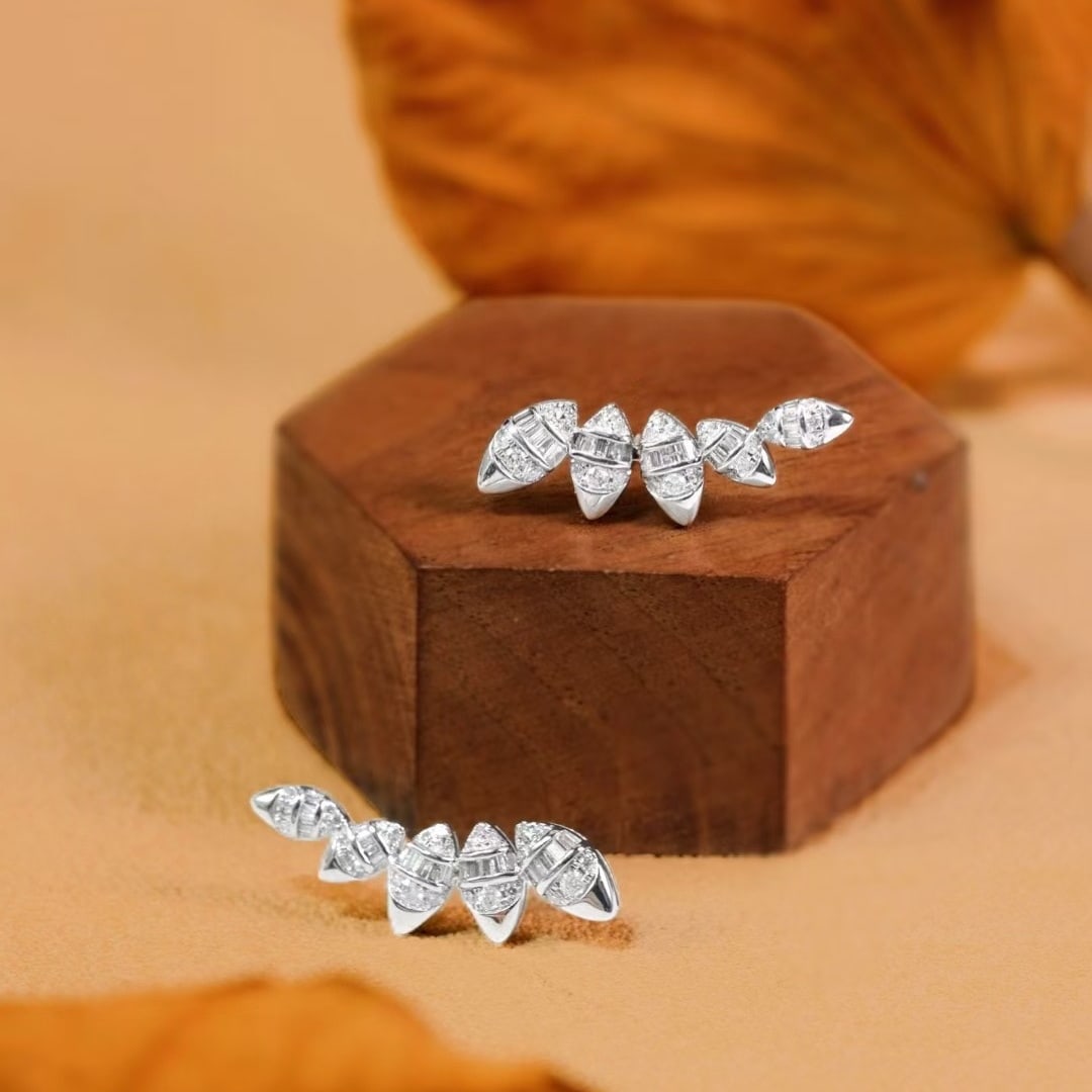 14k Gold 0.66 Ct Natural H Diamond Earrings: Ref:231103240 // gold content:14k gold // main gemstone:diamond // shape:multiple // carat weight:0. 66ct // clarity grade:vs-si // color:h // treatment:natural // Condition: NewLow Estimate: