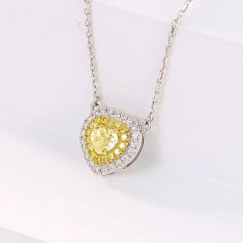 14k Gold 0.35 Ctw Natural Yellow Diamond & Diamond Necklace: Ref:231104038 // gold content:14k gold // main gemstone:yellow diamond // shape:heart // carat weight:0. 22ct // color:yellow // treatment:natural // // adjacent gemstone 2 : diamond // shape:round