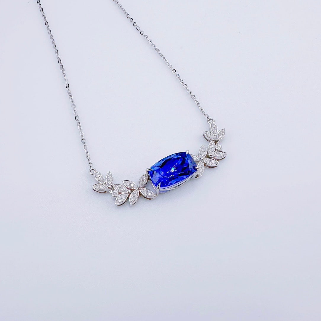 14k Gold 3.58 Ctw Natural Tanzanite & Diamond Necklace: Ref:231104048 // gold content:14k gold // main gemstone:tanzanite // shape:cushion // carat weight:3. 39ct // color:blue // treatment:natural // // adjacent gemstone 2 : diamond // shape:round //