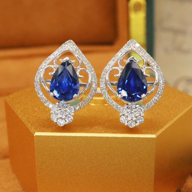 14k Gold 2.23 Ctw Natural Sapphire & Diamond Earrings: Ref:231104072 // gold content:14k gold // main gemstone:sapphire // shape:pear // carat weight:1. 80ct // color:cornflower blue // treatment:natural // // adjacent gemstone 2 : diamond // number of