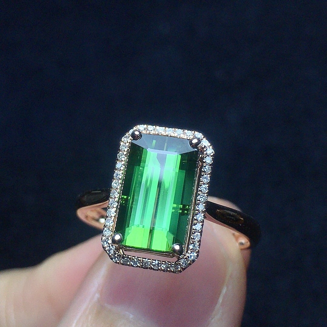 14k Gold 2.38 Ct Natural Tourmaline & Diamond Ring: Ref:231104134 // gold content:14k gold // ring size:7. 25us // // main gemstone:tourmaline // shape:octagonal // carat weight:2. 38ct // color:green // treatment:natural // // adjacent gemstone 2
