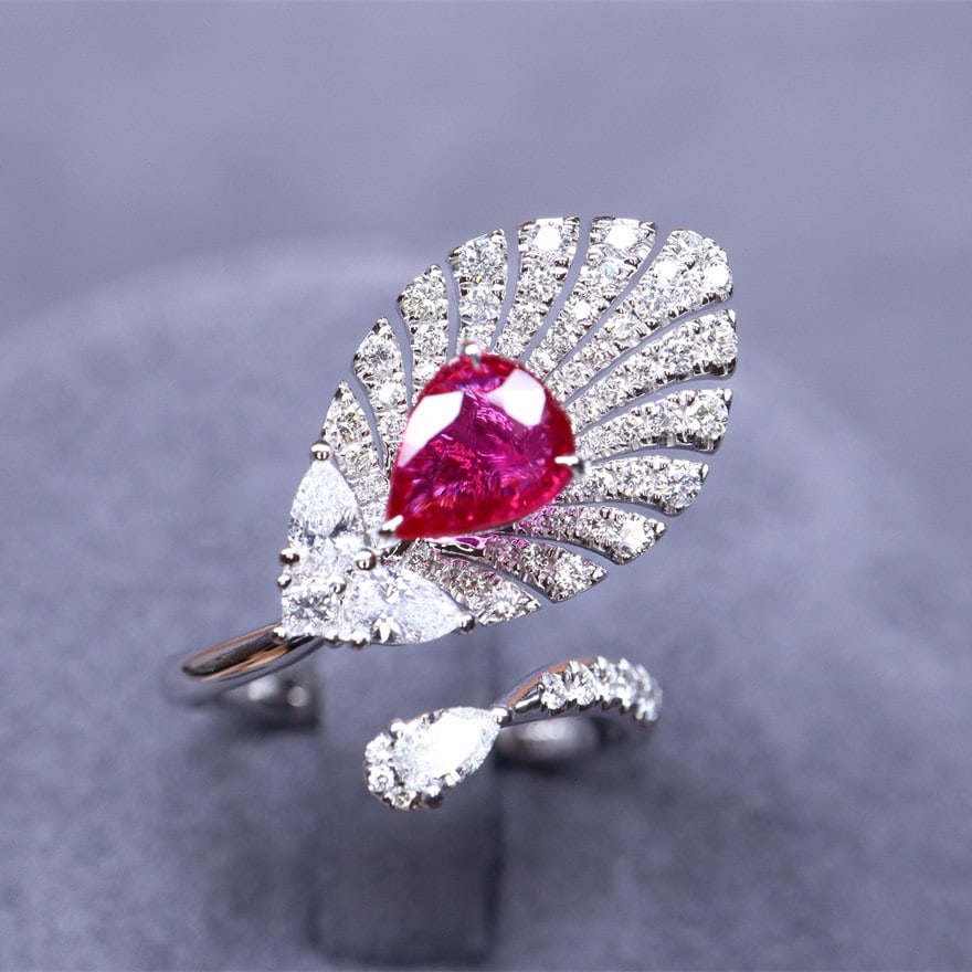 14k Gold 1.77 Ctw Natural Ruby & Diamond Ring: Ref:231104244 // gold content:14k gold // ring size:7. 25us // // main gemstone:ruby // shape:pear // carat weight:1. 01ct // color:red // treatment:natural // // adjacent gemstone 2 : diamond // shap